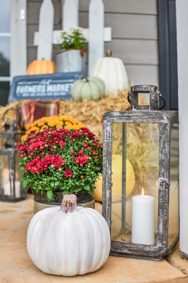 Farmhouse fall front porch with lots of mums, hay and pumpkins-1 Farmhouse fall front porch with lots of mums, hay and pumpkins-1
