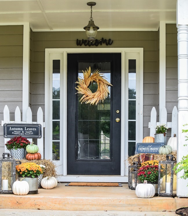 Farmhouse fall front porch with lots of mums, hay and pumpkins-17 Farmhouse fall front porch with lots of mums, hay and pumpkins-17