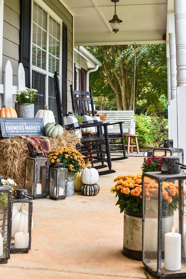 Farmhouse fall front porch with lots of mums, hay and pumpkins-39 Farmhouse fall front porch with lots of mums, hay and pumpkins-39