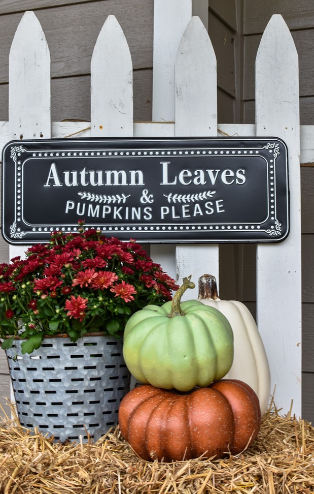 Farmhouse fall front porch with lots of mums, hay and pumpkins-40 Farmhouse fall front porch with lots of mums, hay and pumpkins-40