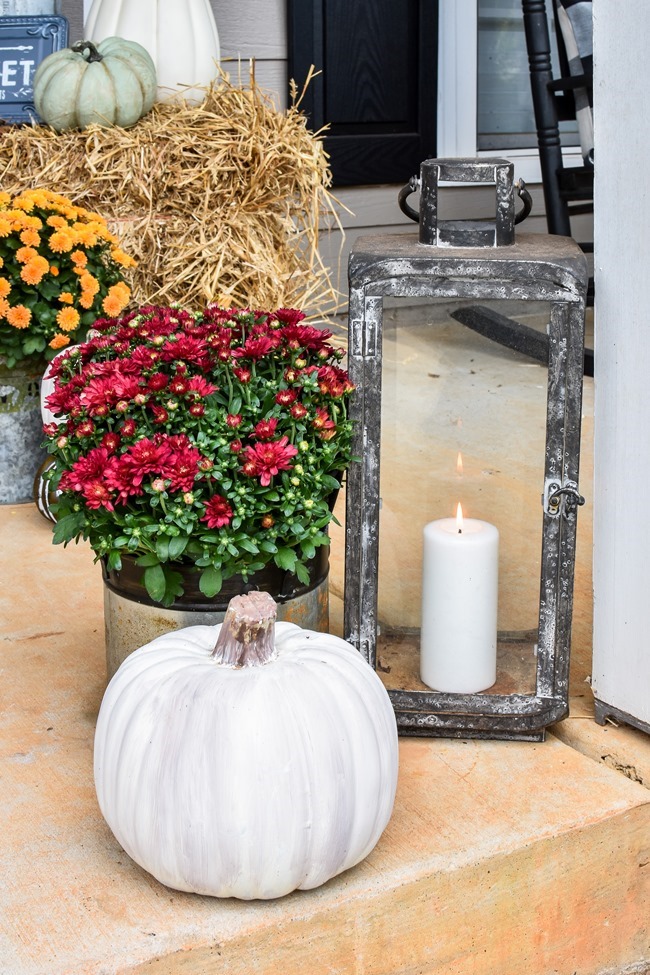Farmhouse fall front porch with lots of mums, hay and pumpkins-42 Farmhouse fall front porch with lots of mums, hay and pumpkins-42