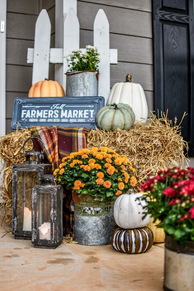 Farmhouse fall front porch with lots of mums, hay and pumpkins-5 Farmhouse fall front porch with lots of mums, hay and pumpkins-5