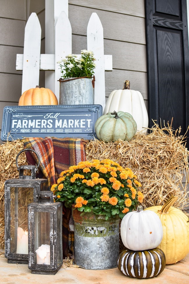 Farmhouse fall front porch with lots of mums, hay and pumpkins-6 Farmhouse fall front porch with lots of mums, hay and pumpkins-6